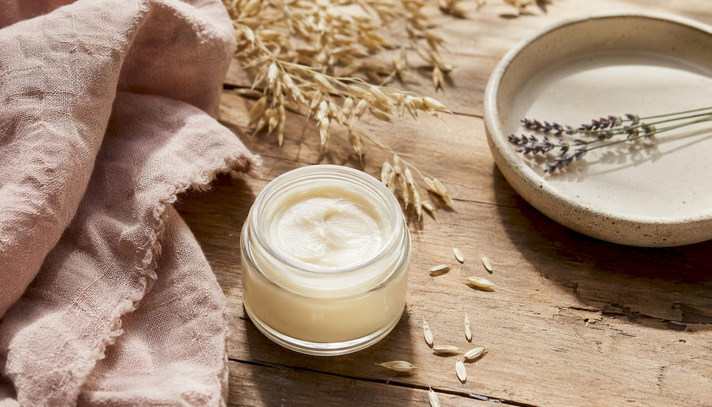Top-down view of lanolin balm with natural props